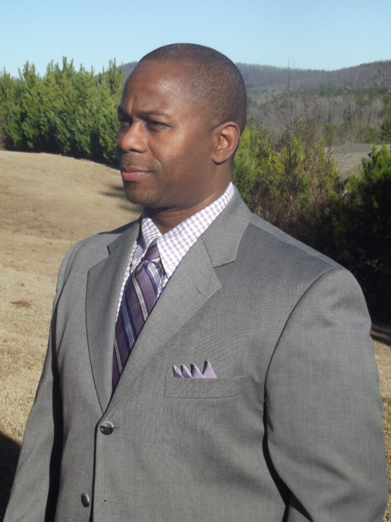 hh headshotgray suit 1